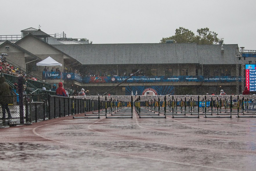 Hurdles are prepared for competition as Hayward Field and its audience experience a downpour of rain. Day Eight of the U.S. Olympic Trials Track and Field continued on Friday at Hayward Field in Eugene, Ore. and will continue through July 10. Photo by Katie Pietzold
