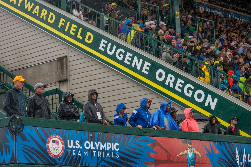 Coaches and spectators attempt to stay dry during the events. Day Eight of the U.S. Olympic Trials Track and Field continued on Friday at Hayward Field in Eugene, Ore. and will continue through July 10. Photo by Katie Pietzold