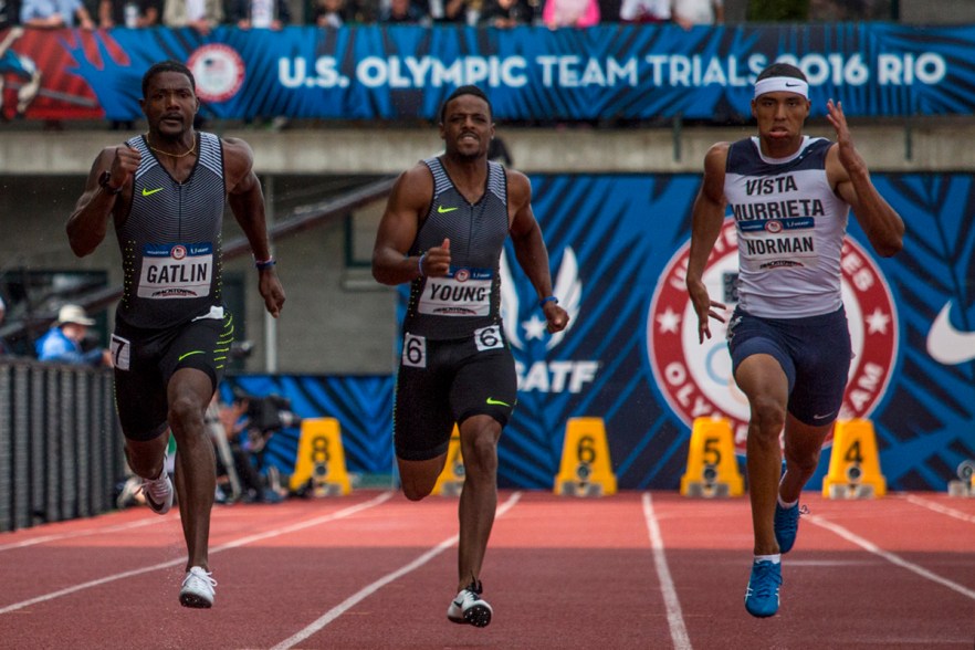 Nike’s Justin Gatlin, Nike’s Isiah Young, and high school athlete Michael Norman race to the finish in the first heat of the men’s 200 meter dash semis. Day Eight of the U.S. Olympic Trials Track and Field continued on Friday at Hayward Field in Eugene, Ore. and will continue through July 10. Photo by Katie Pietzold