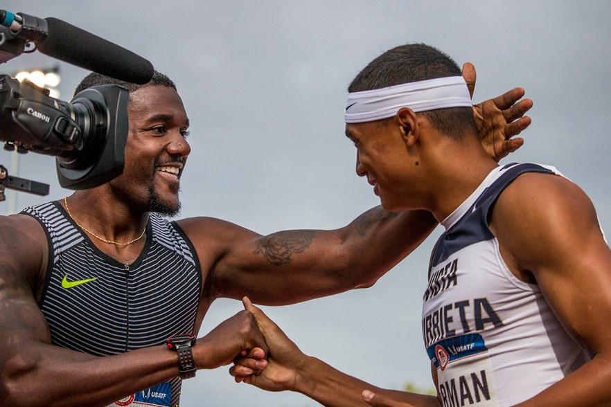 Nike’s Justin Gatlin congratulates high school athlete Michael Norman after Norman beat Gatlin in the semis of the men’s 200 meter dash. Norman ran a 20.21 second race with Gatlin in a close second place at 20.23. Day Eight of the U.S. Olympic Trials Track and Field continued on Friday at Hayward Field in Eugene, Ore. and will continue through July 10. Photo by Katie Pietzold