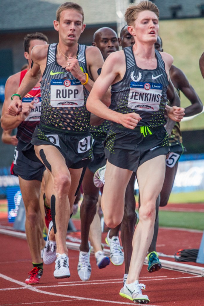 Former Oregon Ducks and current runners for Nike OP, Galen Rupp and Eric Jenkins complete a lap around Hayward Field during the men’s 5,000 meter run. Day Four of the U.S. Olympic Trials Track and Field were held Monday at Hayward Field in Eugene, Ore. and will continue through July 10. Photo by Katie Pietzold