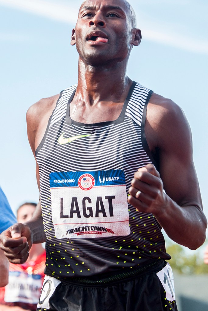 Nike’s Bernard Lagat runs through the finish line after placing first in the second heat of the men’s 5,000 meter run. Day Four of the U.S. Olympic Trials Track and Field were held Monday at Hayward Field in Eugene, Ore. and will continue through July 10. Photo by Katie Pietzold