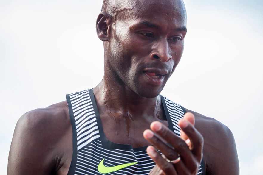 Nike’s Bernard Lagat claps his hands after placing first in the second heat of the men’s 5,000 meter run. Day Four of the U.S. Olympic Trials Track and Field were held Monday at Hayward Field in Eugene, Ore. and will continue through July 10. Photo by Katie Pietzold