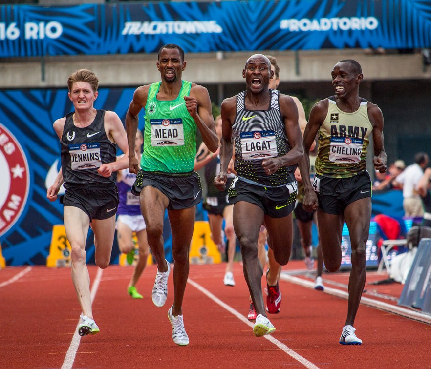 Nike OP Eric Jenkins, Nike OTC Hassan Mead, Nike's Bernard Lagat, and U.S. Army's Paul Chelimo race towards the finish of the men's 5,000 meter finals. Day Nine of the U.S. Olympic Trials Track and Field continued on Saturday at Hayward Field in Eugene, Ore. and will continue through July 10. Photo by Katie Pietzold