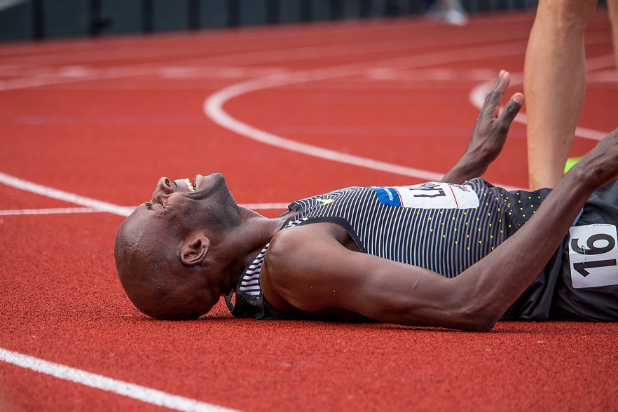 Nike's Bernard Lagat cries in celebration of qualifying for Rio after placing first in 13:35.50 of the men's 5,000 meter run finals. Day Nine of the U.S. Olympic Trials Track and Field continued on Saturday at Hayward Field in Eugene, Ore. and will continue through July 10. Photo by Katie Pietzold
