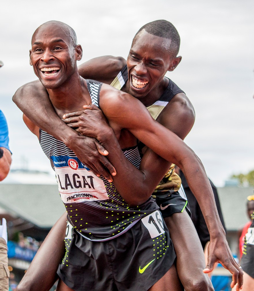 U.S. Army's Paul Chelimo jumps on Nike Bernard Lagat's back after the two qualified for Rio in the men's 5,000 meter run finals. Day Nine of the U.S. Olympic Trials Track and Field continued on Saturday at Hayward Field in Eugene, Ore. and will continue through July 10. Photo by Katie Pietzold