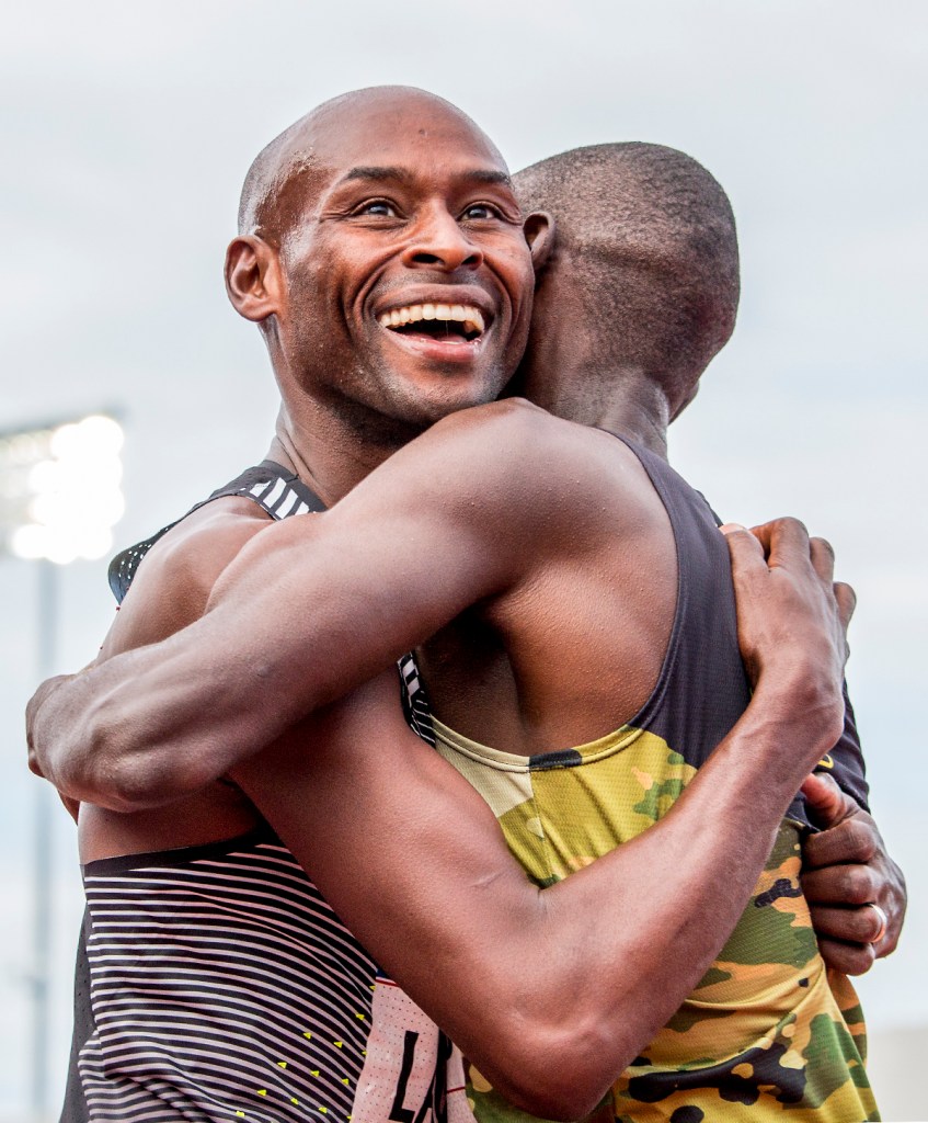 Nike's Bernard Lagat and U.S. Army Paul Chelimo embrace one another after the two qualify for Rio. Day Nine of the U.S. Olympic Trials Track and Field continued on Saturday at Hayward Field in Eugene, Ore. and will continue through July 10. Photo by Katie Pietzold