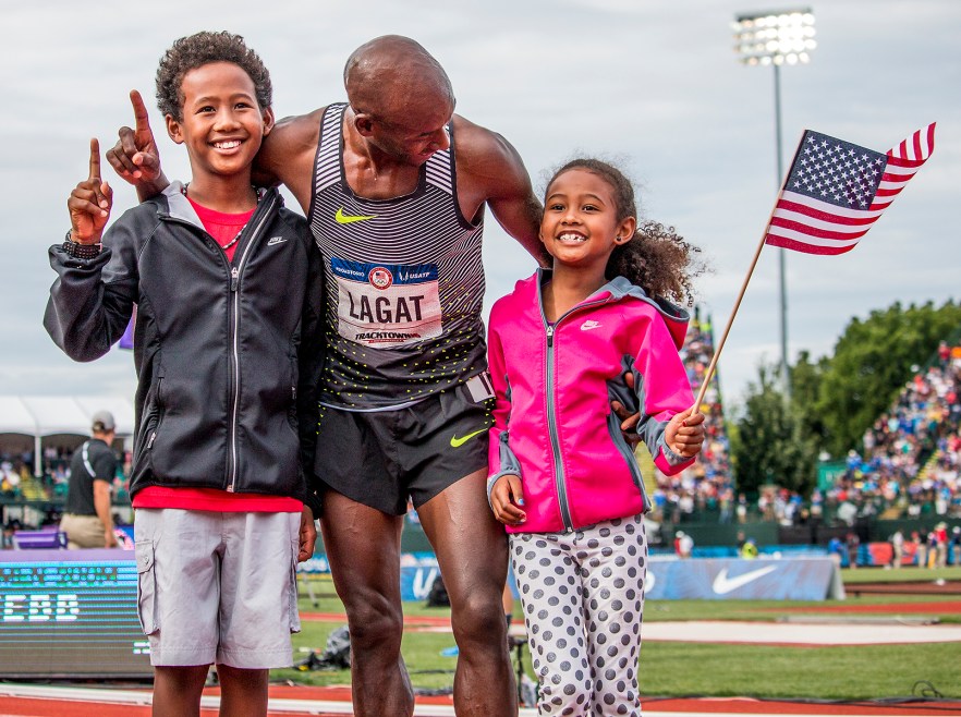 Nike's Bernard Lagat celebrates with his children after qualifying for Rio in the men's 5,000 meter run. Day Nine of the U.S. Olympic Trials Track and Field continued on Saturday at Hayward Field in Eugene, Ore. and will continue through July 10. Photo by Katie Pietzold