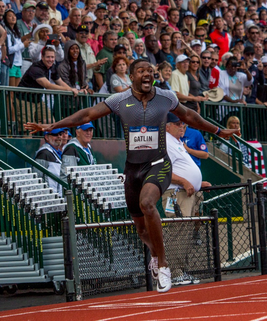 Nike's Justin Gatlin celebrates as he qualifies for Rio in the men's 200 meter dash finals. Day Nine of the U.S. Olympic Trials Track and Field continued on Saturday at Hayward Field in Eugene, Ore. and will continue through July 10. Photo by Katie Pietzold