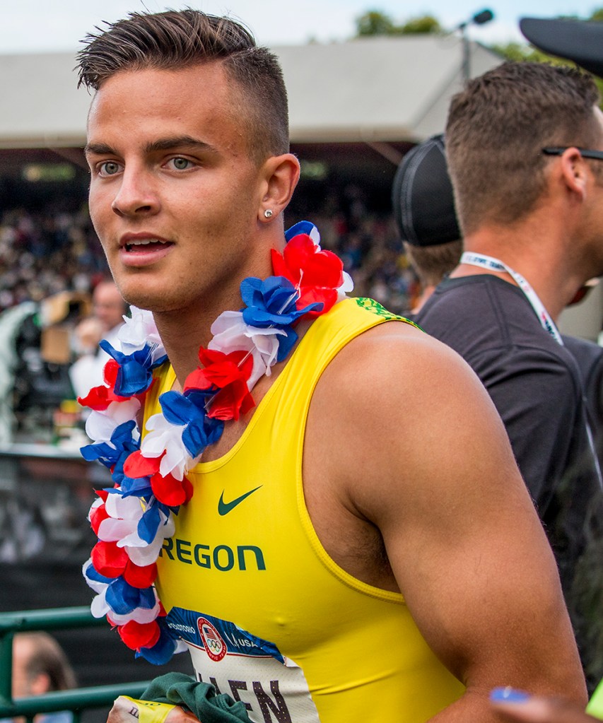 Oregon Duck Devon Allen makes his way out of the stands after jumping over the fence to celebrate his victory in the men's 110 meter hurdle finals. Allen will head to Rio after running a 13.03. Day Nine of the U.S. Olympic Trials Track and Field continued on Saturday at Hayward Field in Eugene, Ore. and will continue through July 10. Photo by Katie Pietzold
