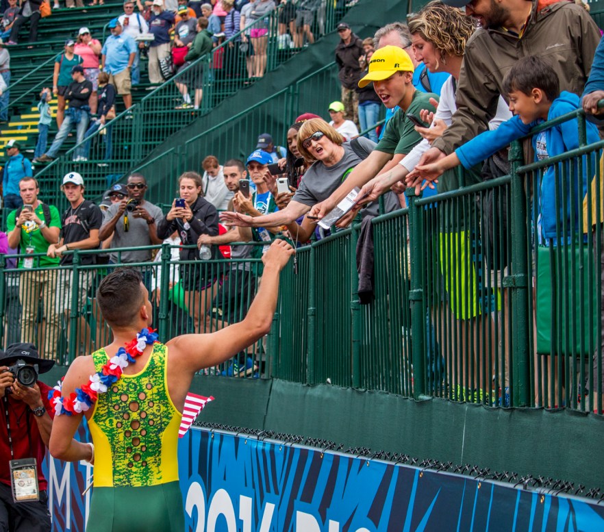 Oregon Duck Devon Allen begins a victory lap around Hayward Field after qualifying for Rio in the men's 110 meter hurdle finals. Allen placed first in 13.03. Day Nine of the U.S. Olympic Trials Track and Field continued on Saturday at Hayward Field in Eugene, Ore. and will continue through July 10. Photo by Katie Pietzold