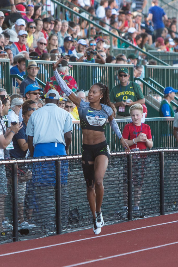Sanya Richards-Ross waves to the crowd as she makes her way around Hayward Field after stepping out of the women’s 400 meter dash. Richards-Ross had been struggling with an injury prior to the trials and was unable to complete the race. Day One of the U.S. Olympic Trials Track and Field began on Friday at Hayward Field in Eugene, Ore. and will continue through July 10. Photo by Katie Pietzold