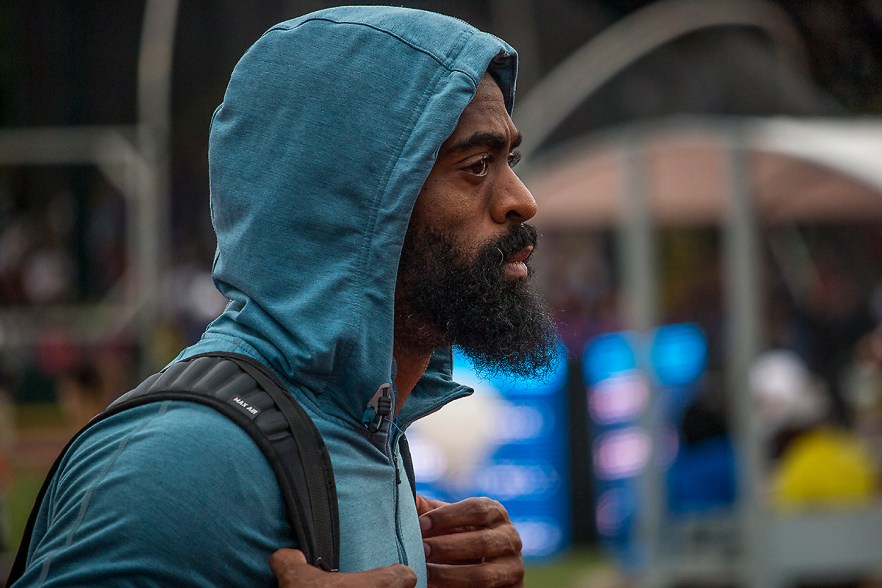 Tyson Gay walks towards the starter blocks in the prelims of the men’s 200 meter dash as it begins to rain at Hayward Field. Day Seven of the U.S. Olympic Trials Track and Field were held Thursday at Hayward Field in Eugene, Ore. and will continue through July 10. Photo by Katie Pietzold