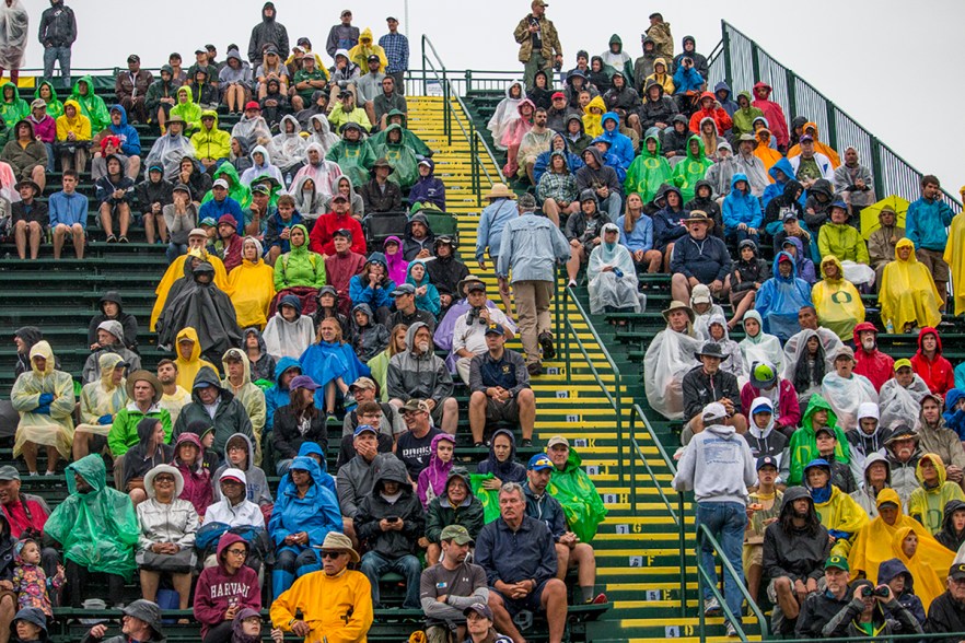 Spectators attempt to stay dry during a downpour in the afternoon. Day Seven of the U.S. Olympic Trials Track and Field were held Thursday at Hayward Field in Eugene, Ore. and will continue through July 10. Photo by Katie Pietzold
