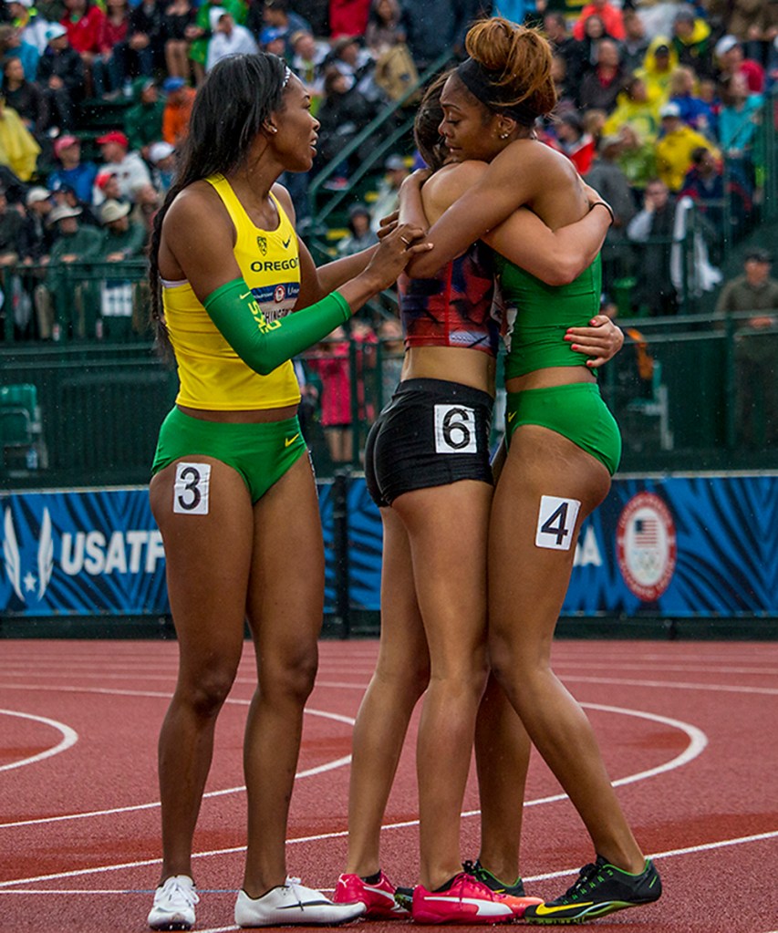 Oregon Duck Ariana Washington, former Oregon Duck and athlete for Puma, and Oregon Duck Deajah Stevens celebrate as Prandini and Stevens qualify for the 200 meter dash in Rio. Day Ten of the U.S. Olympic Trials Track and Field concluded on Sunday at Hayward Field in Eugene, Ore. Competition lasted July 1 - July 10. Photo by Katie Pietzold