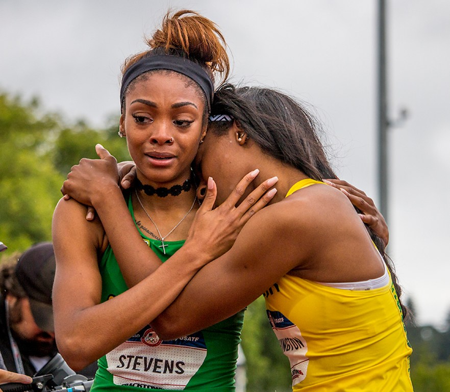Oregon Ducks Deajah Stevens and Ariana Washington embrace eachother after the women’s 200 meter dash finals. Stevens placed second in 22.30 seconds sending her to competition in Rio. Day Ten of the U.S. Olympic Trials Track and Field concluded on Sunday at Hayward Field in Eugene, Ore. Competition lasted July 1 - July 10. Photo by Katie Pietzold