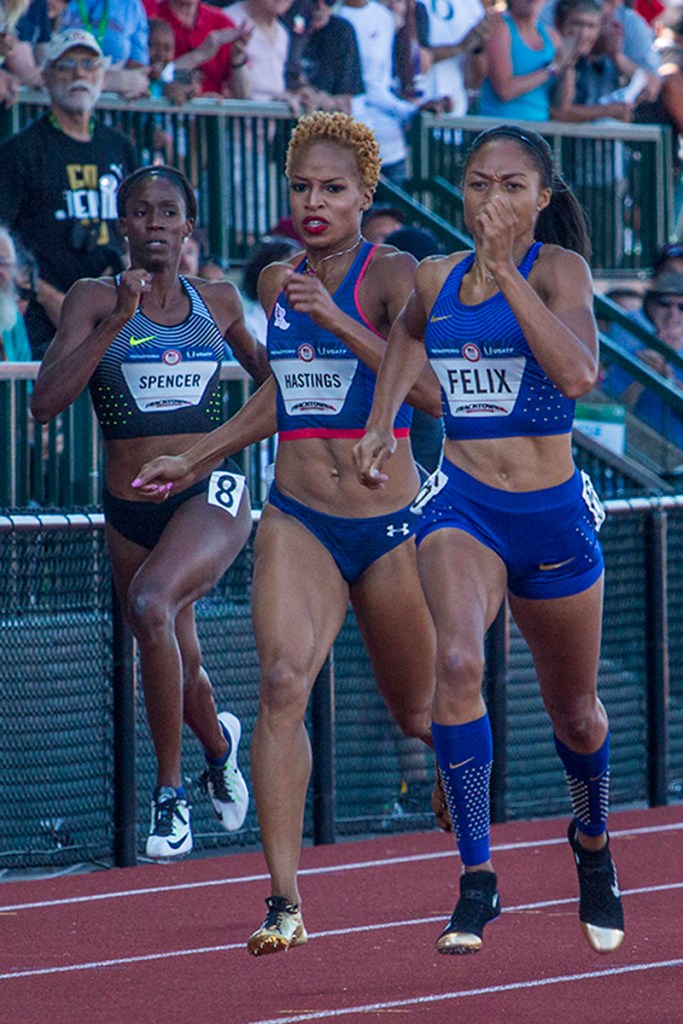 Nike’s Ashey Spencer, Under Armour’s Natasha Hastings, and Nike’s Allyson Felix sprint to the finish of the women’s 400 meter finals. Felix and Hastings will compete in Rio after placing first and third respectively. Day Three of the U.S. Olympic Trials Track and Field were held Sunday at Hayward Field in Eugene, Ore. and will continue through July 10. Photo by Katie Pietzold