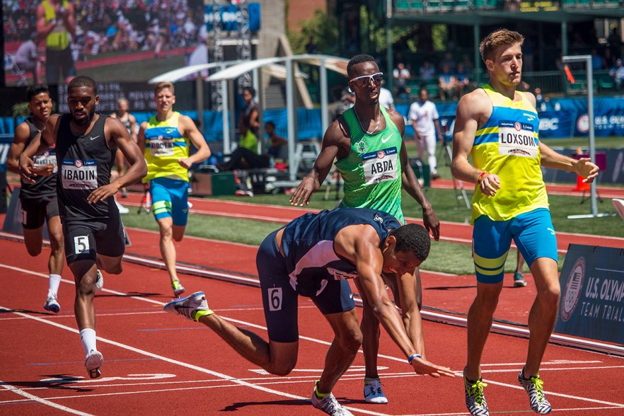 Edose Ibadin, Nike OTC’s Harun Abda, and Brooks/Beasts’ Casimir Loxsom attempt to avoid Penn. State’s Isaiah Harris as he falls down in the final stretch of the men’s 800 meter run. Day Two of the U.S. Olympic Trials Track and Field were held Saturday at Hayward Field in Eugene, Ore. and will continue through July 10. Photo by Katie Pietzold