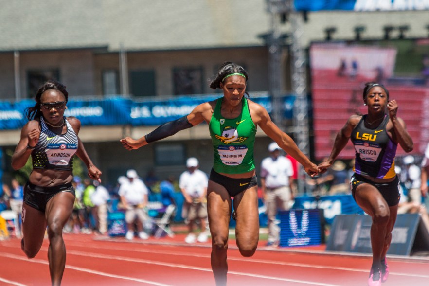 Oregon Duck Ariana Washington leans into the finish as she attempts to beat Texas Longhorn Morolake Akinosun and LSU Tiger Mikiah Brisco for first in the third heat of the women’s 100 meter dash semis. Day Two of the U.S. Olympic Trials Track and Field were held Saturday at Hayward Field in Eugene, Ore. and will continue through July 10. Photo by Katie Pietzold
