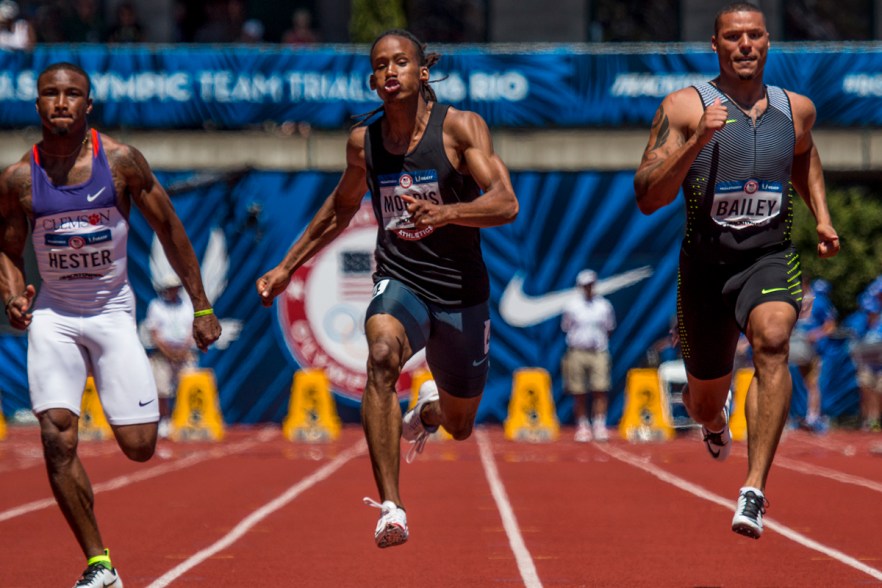 Clemson Tiger Tevin Hester, Ultimate Speed’s Joe Morris, and Nike’s Ryan Bailey race to the finish of the men’s 100 meter dash prelims. Day Two of the U.S. Olympic Trials Track and Field were held Saturday at Hayward Field in Eugene, Ore. and will continue through July 10. Photo by Katie Pietzold